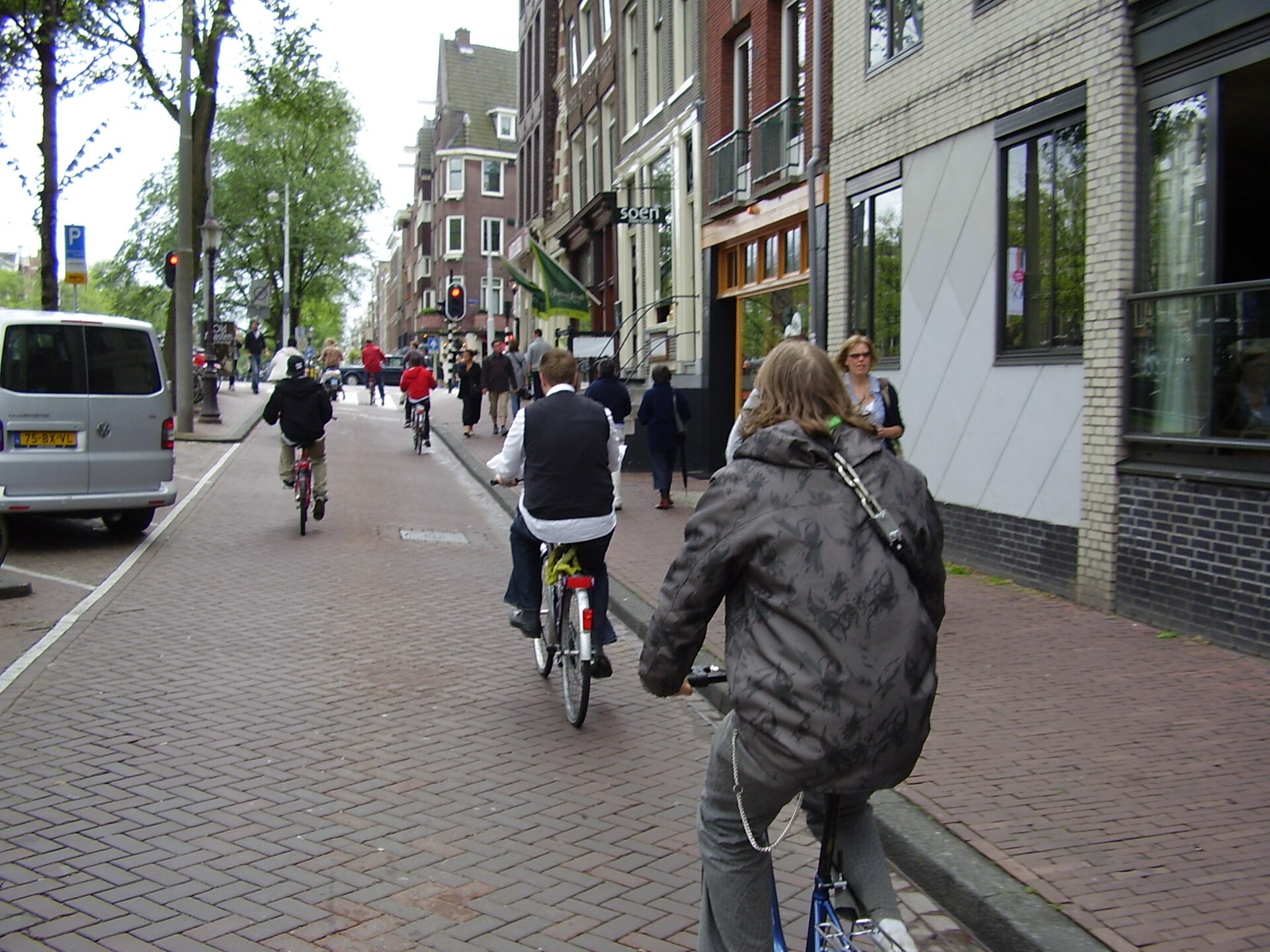 People cycling through a city street for bike commute tracking